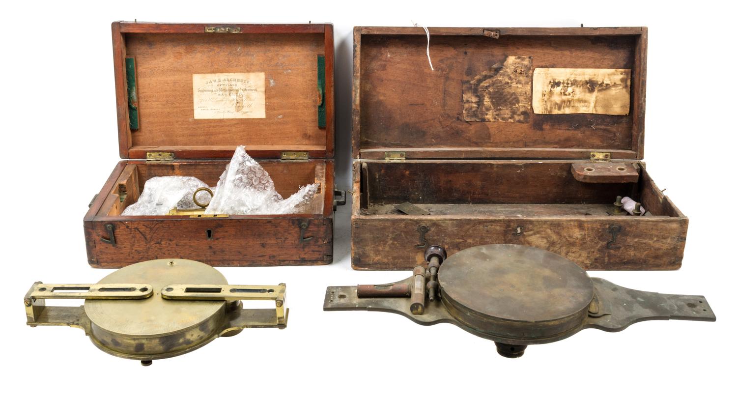 A Group of Two Brass Surveor's Compasses Width of larger example 16 inches.
