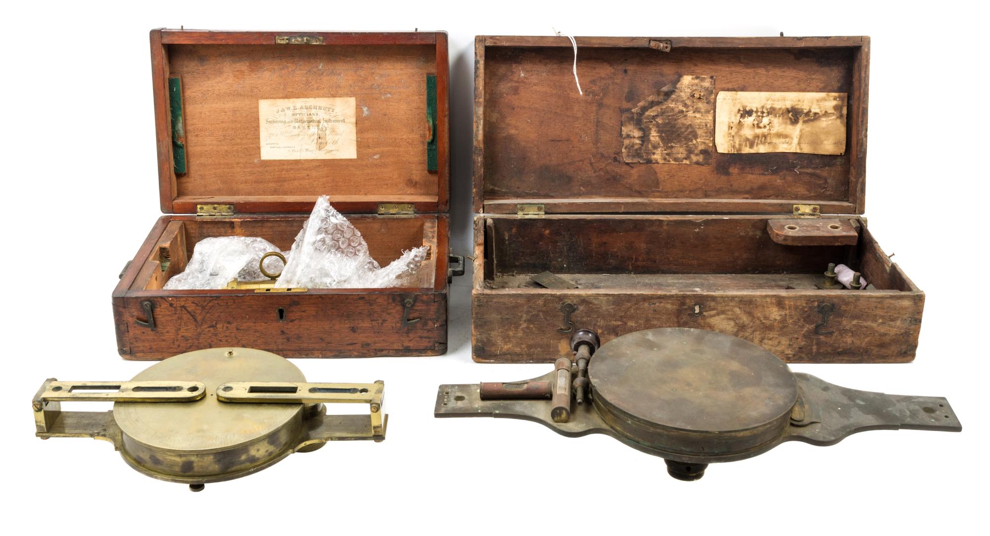 A Group of Two Brass Surveor's Compasses Width of larger example 16 inches.