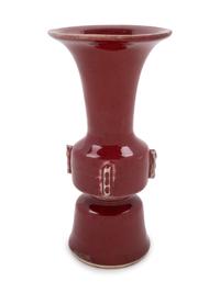 A Chinese Copper Red Glazed Porcelain Gu Vase