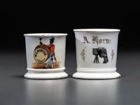 Two Porcelain Occupational Shaving Mugs