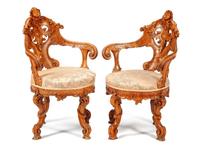 A Pair of Venetian Carved Armchairs