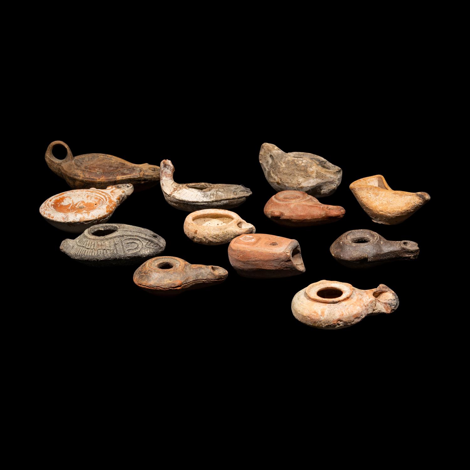 Twelve Greco-Roman Terracotta Lamps