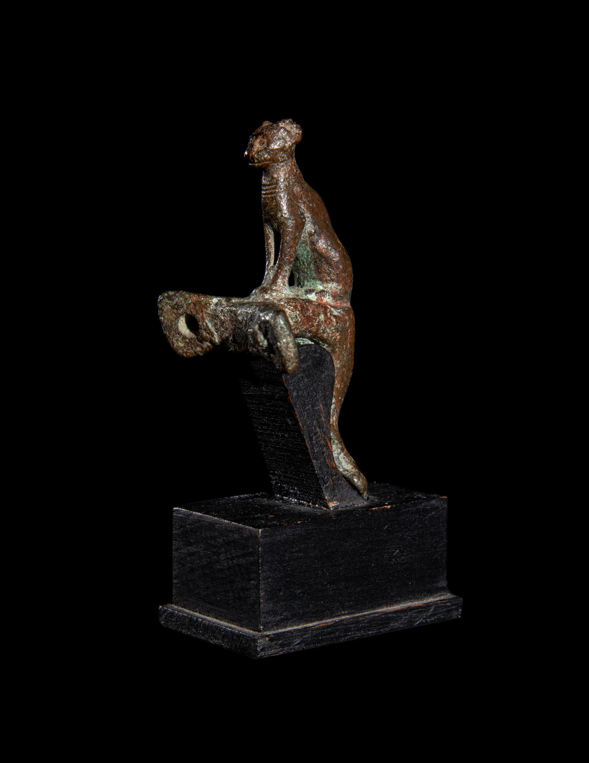 An Egyptian Bronze Handle with a Cat
