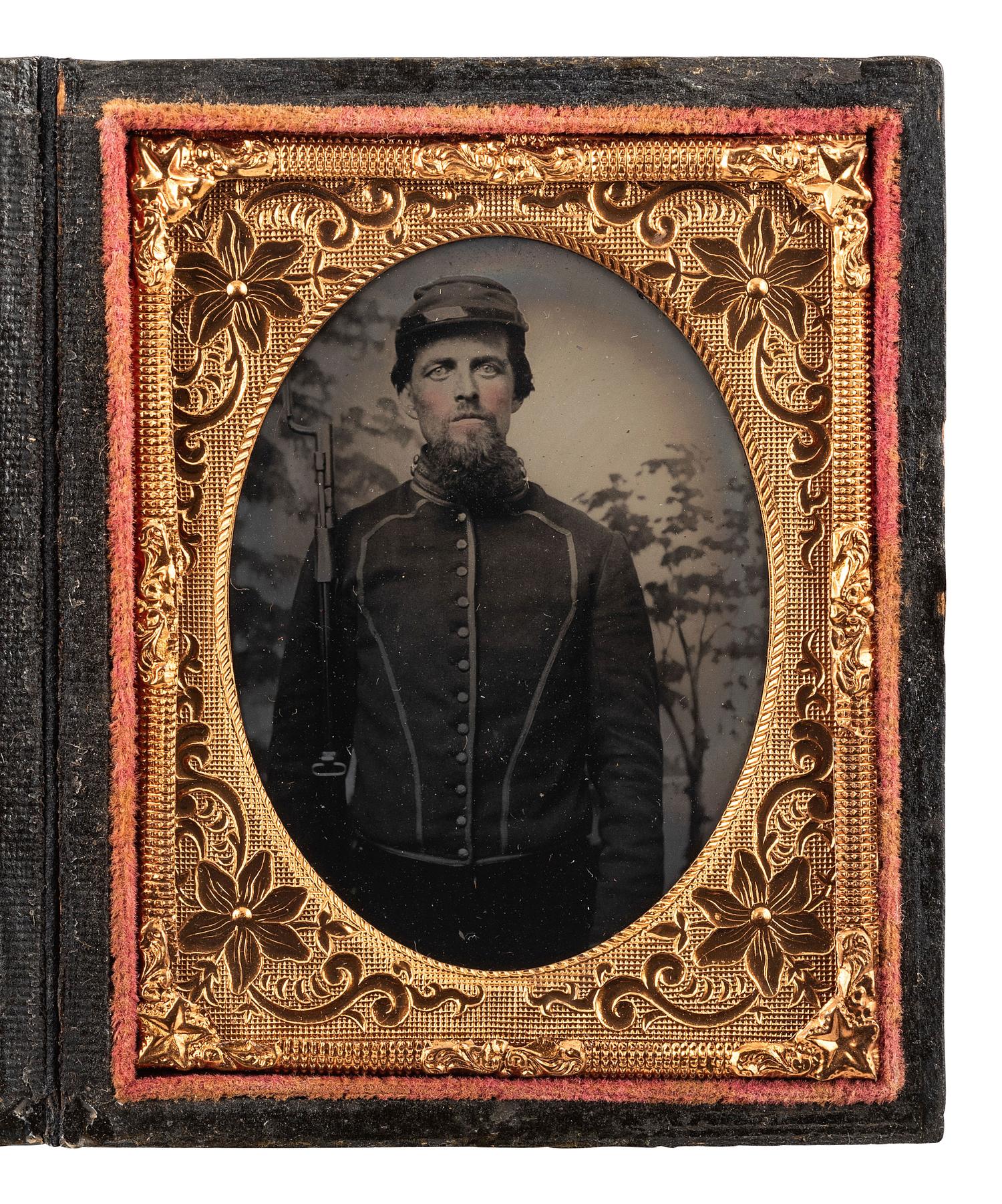 [CIVIL WAR]. Ninth plate tintype portrait of Pvt. William H. Hughes, Union Light Guard Ohio Cavalry. With Post-war cabinet card of Hughes' family.