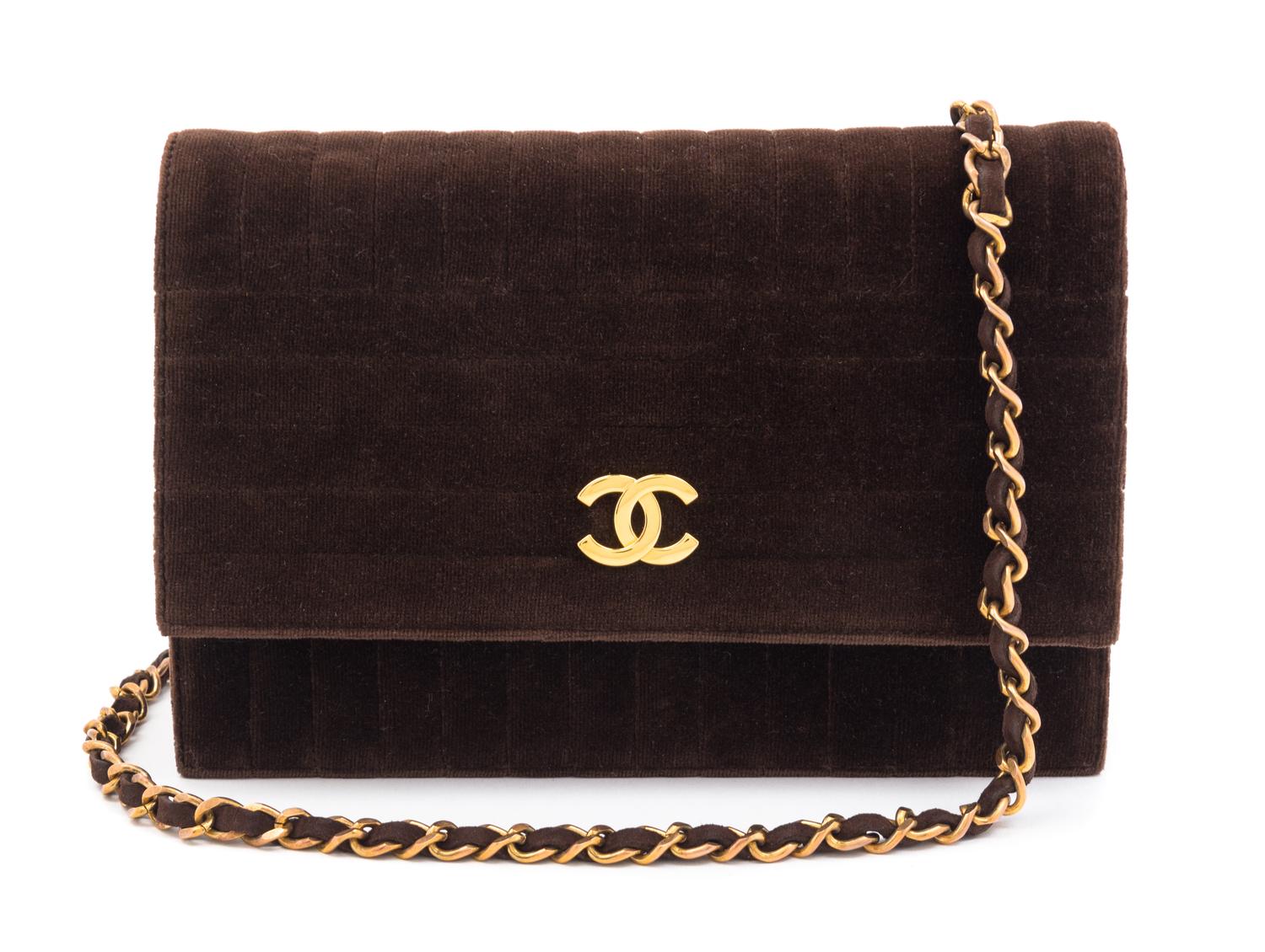 A Chanel Brown Velvet Handbag, 8.5" x 6" x 1".