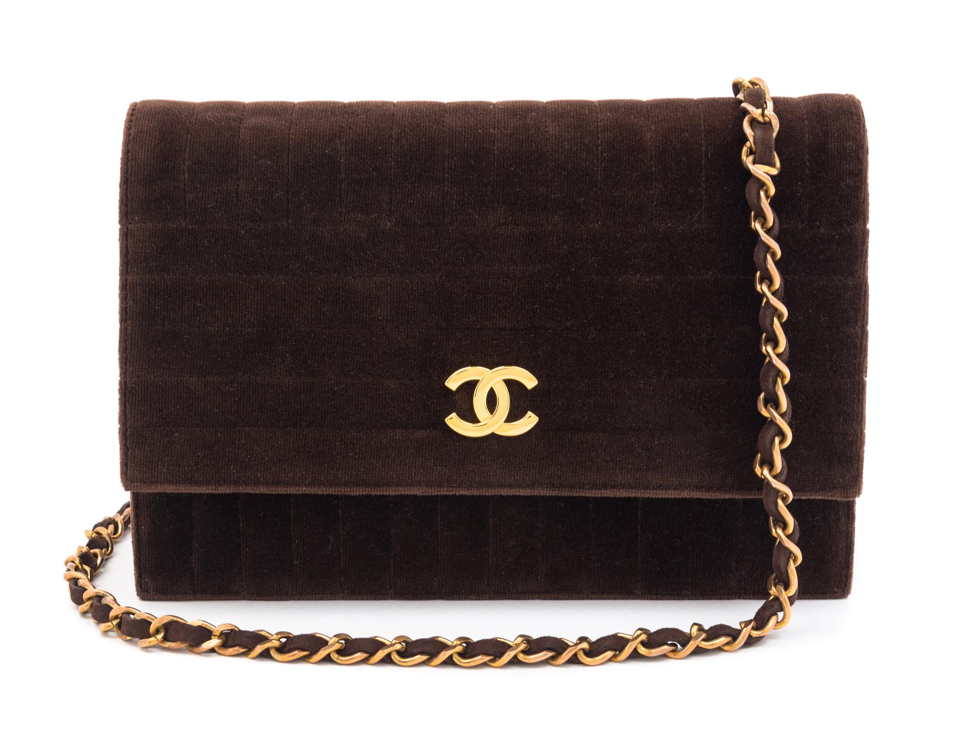 A Chanel Brown Velvet Handbag, 8.5" x 6" x 1".