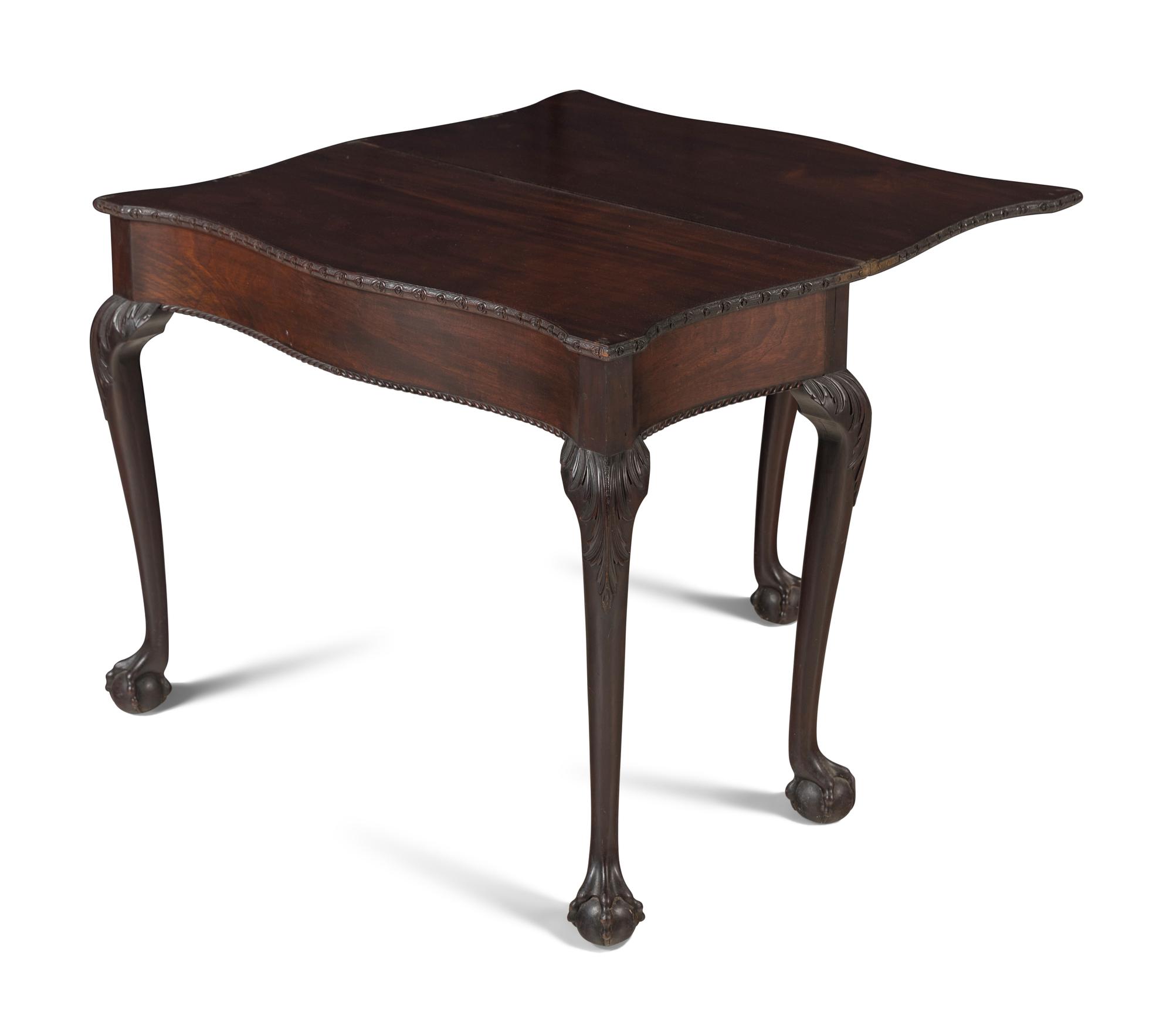 A George III Carved Mahogany Flip-Top Table