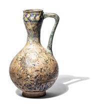 A Ilkhanid Clear-Glazed Ewer