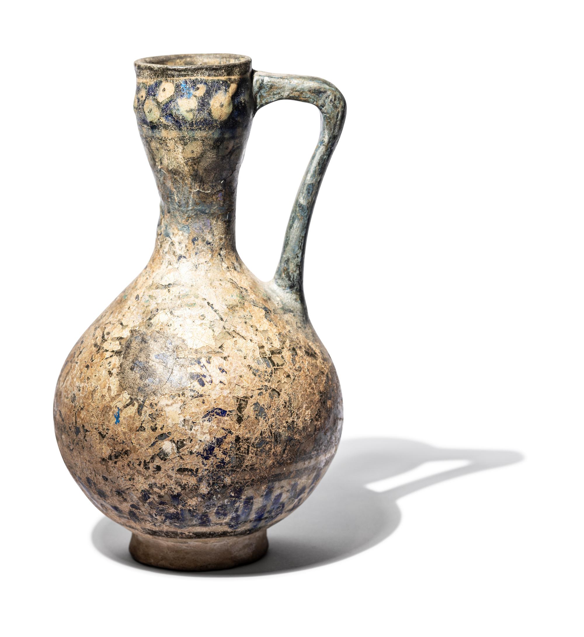 A Ilkhanid Clear-Glazed Ewer