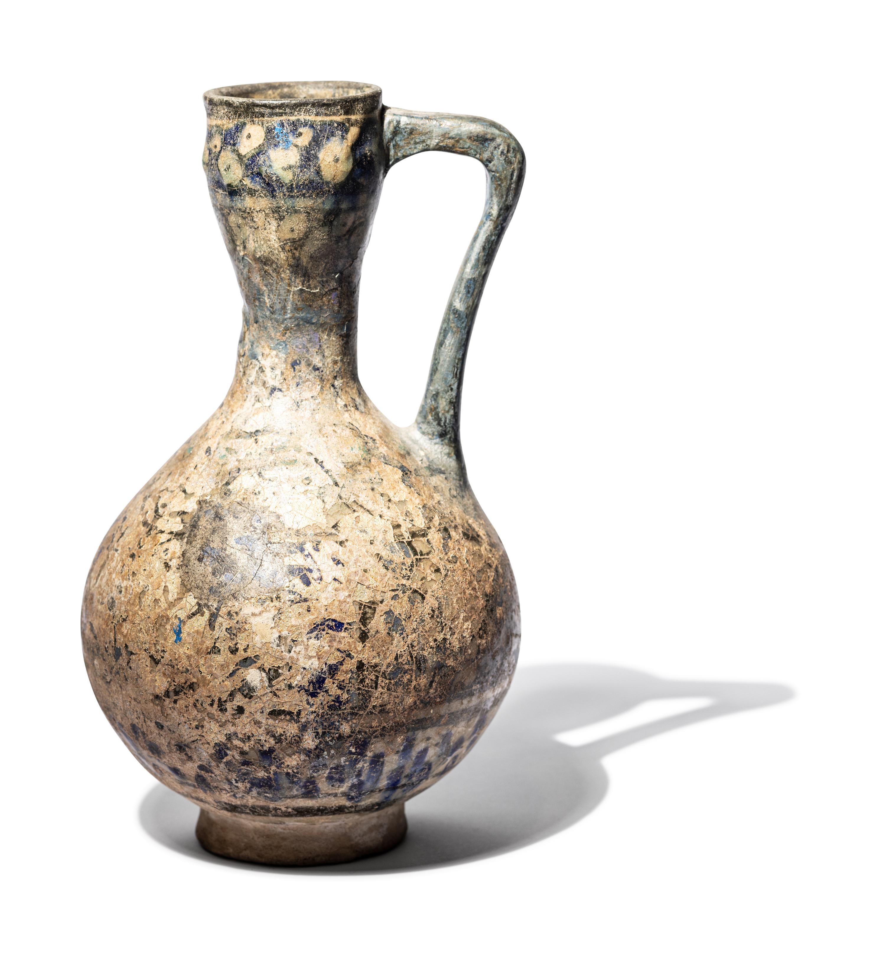 A Ilkhanid Clear-Glazed Ewer
