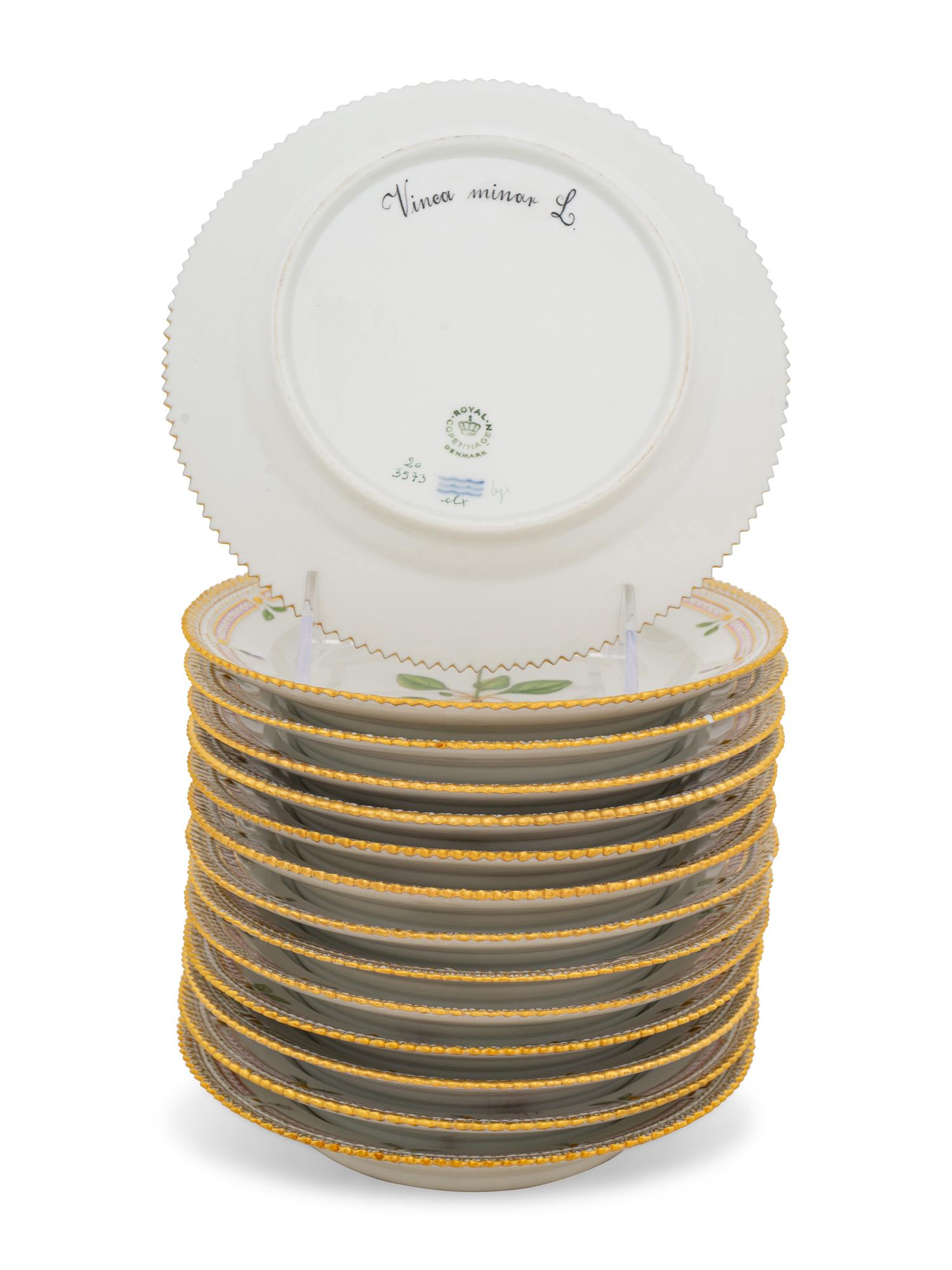 A Set of Fourteen Royal Copenhagen Flora Danica Salad Plates