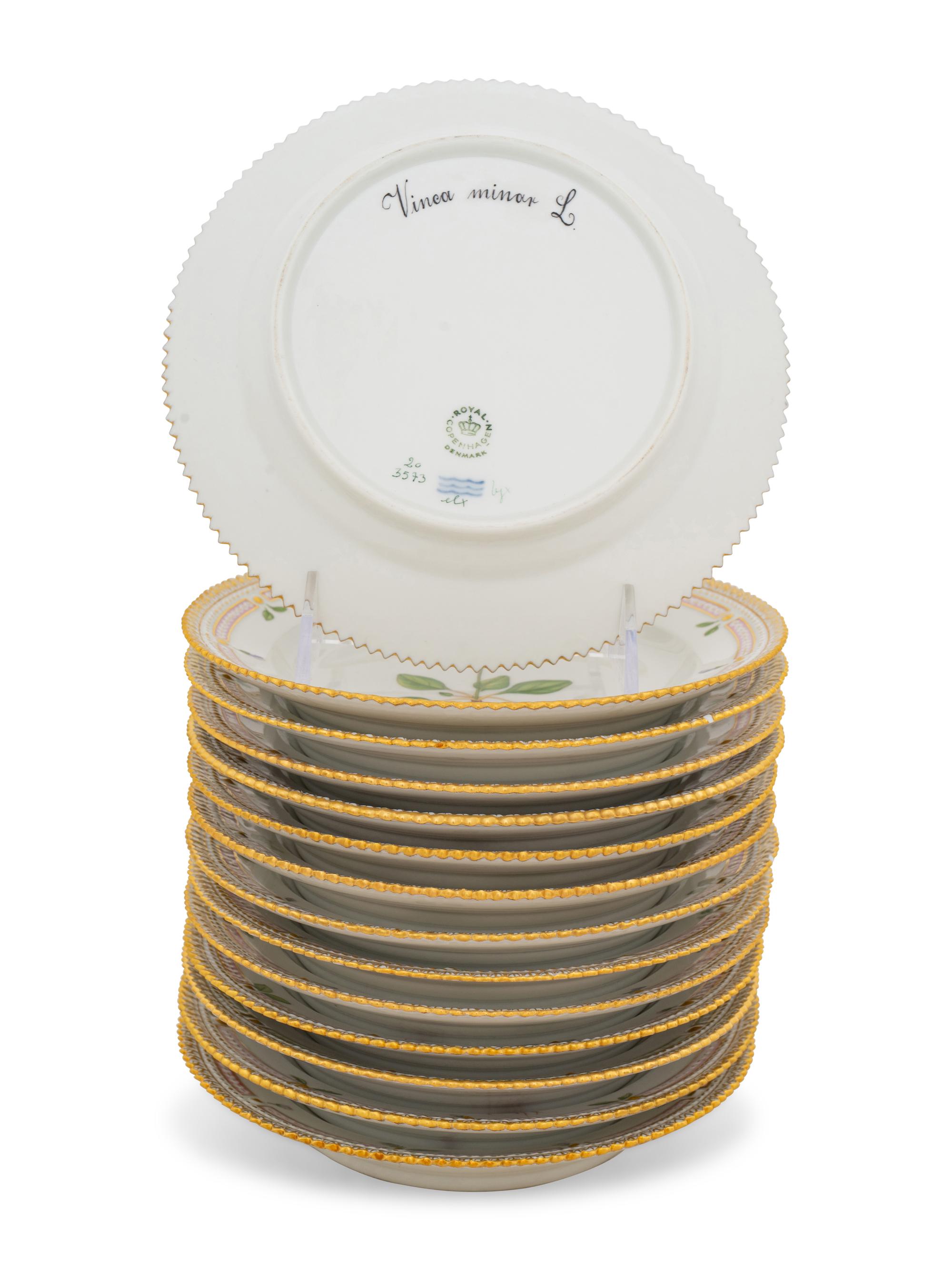 A Set of Fourteen Royal Copenhagen Flora Danica Salad Plates