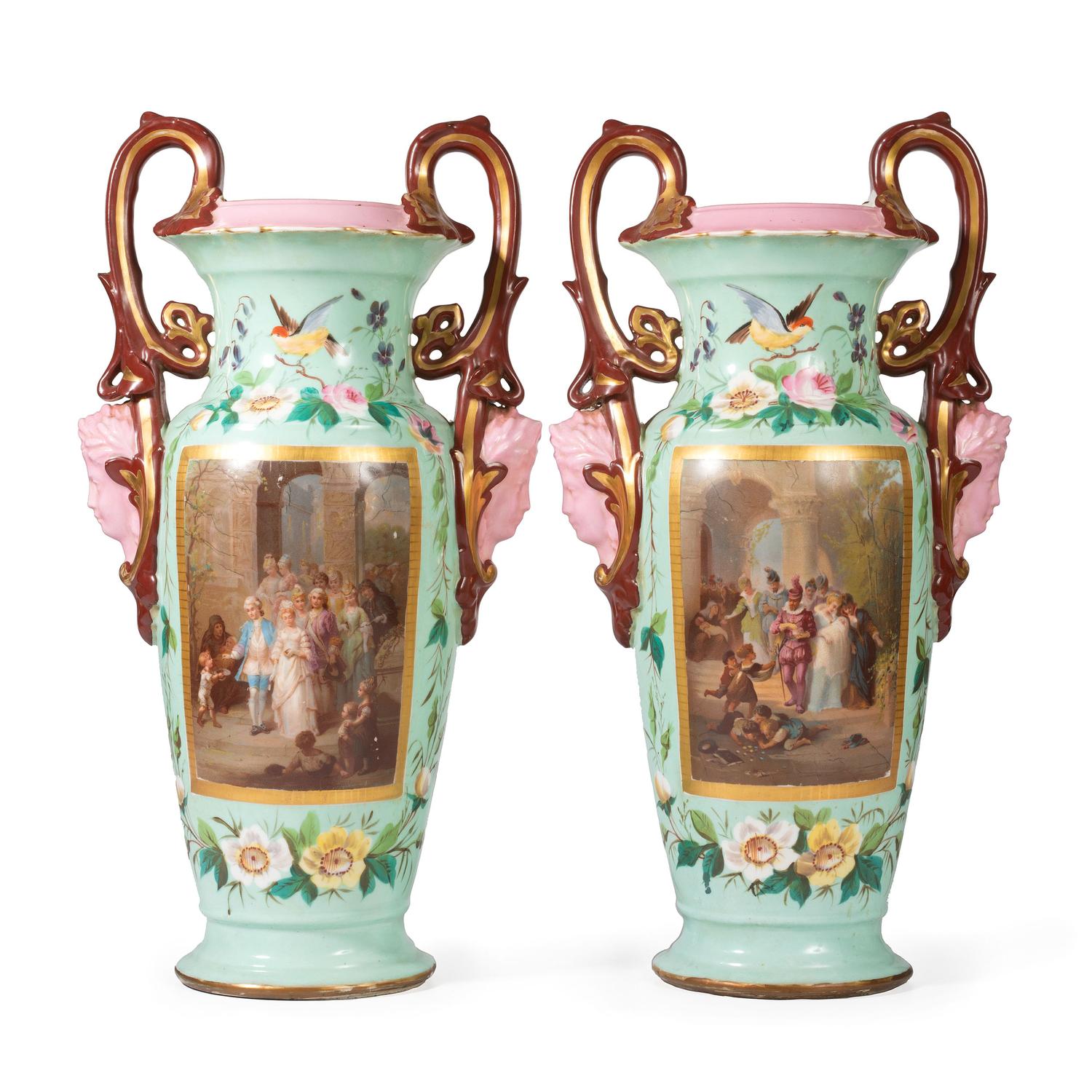 A Pair of Continental Porcelain Urns with Hand Painted and Transfer Decoration