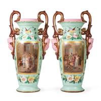 A Pair of Continental Porcelain Urns with Hand Painted and Transfer Decoration