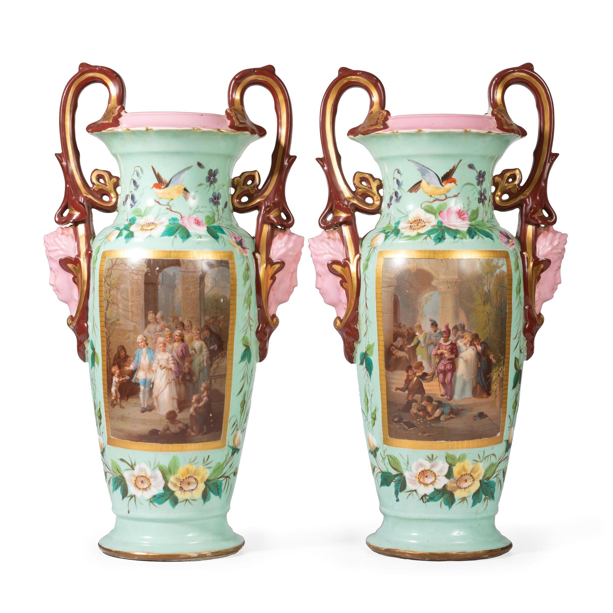 A Pair of Continental Porcelain Urns with Hand Painted and Transfer Decoration