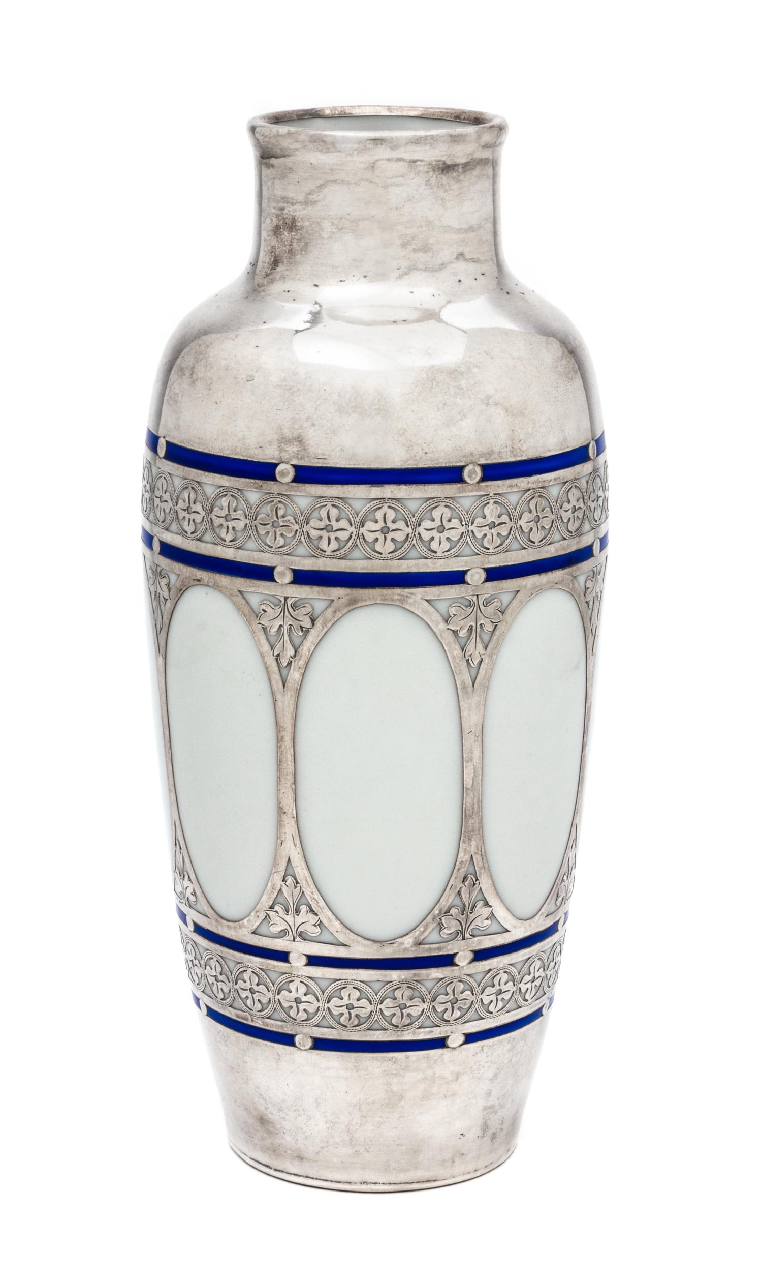 A Silver Overlay Porcelain Vase Height 7 1/4 inches.