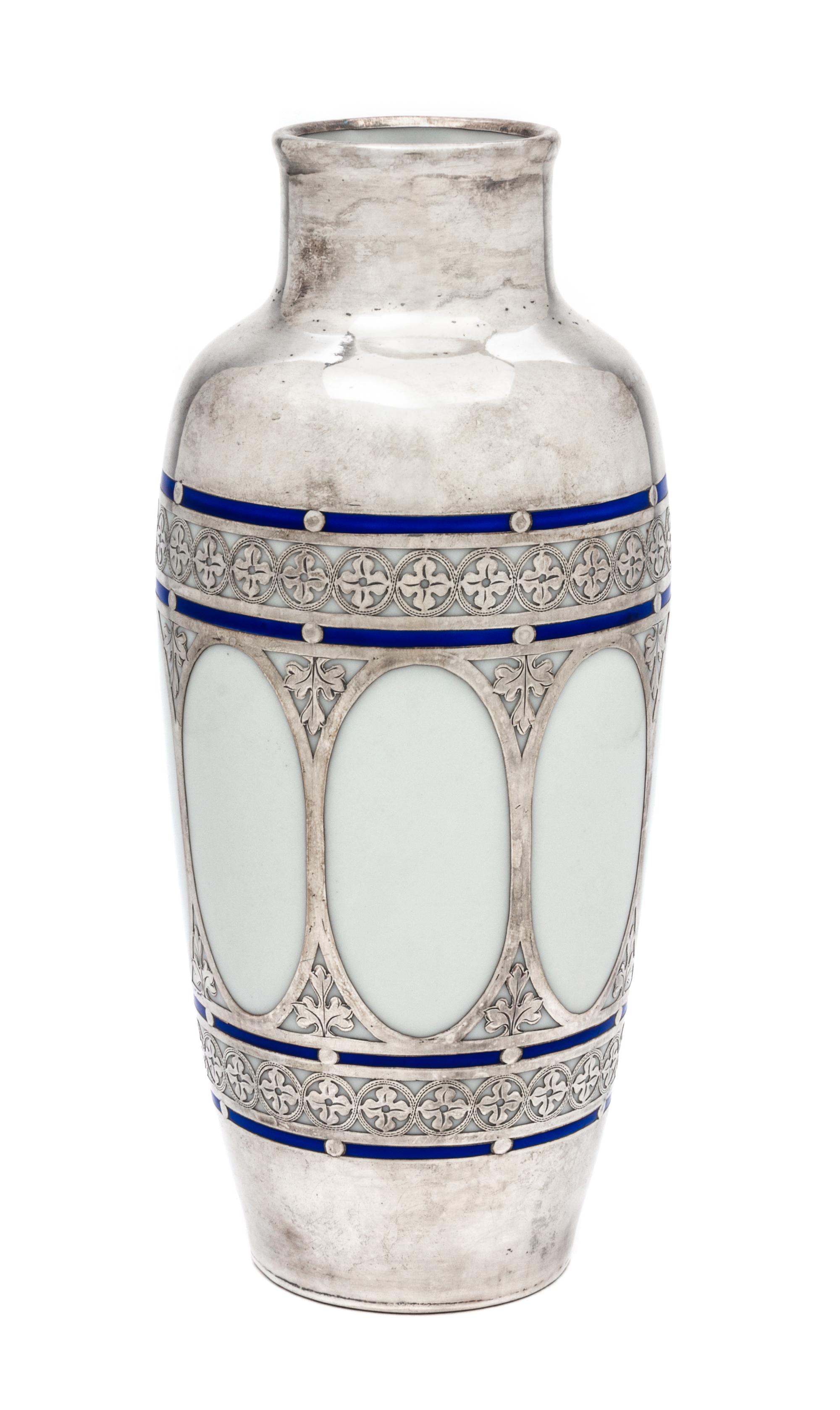 A Silver Overlay Porcelain Vase Height 7 1/4 inches.