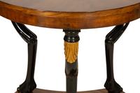 A Pair of Empire Style Walnut, Black Lacquer and Parcel Gilt Side Tables