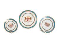 A Samson et Cie Parcel Gilt and Armorial Decorated Part Dinner Service