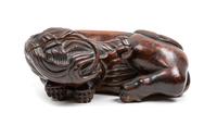 A Chinese Hardwood Figure of an Elephant Length 11 1/2 inches. — 20TH CENTURY