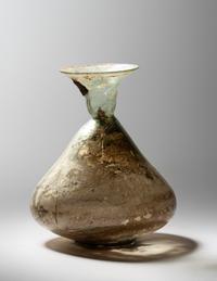 A Roman Green Glass Beaker