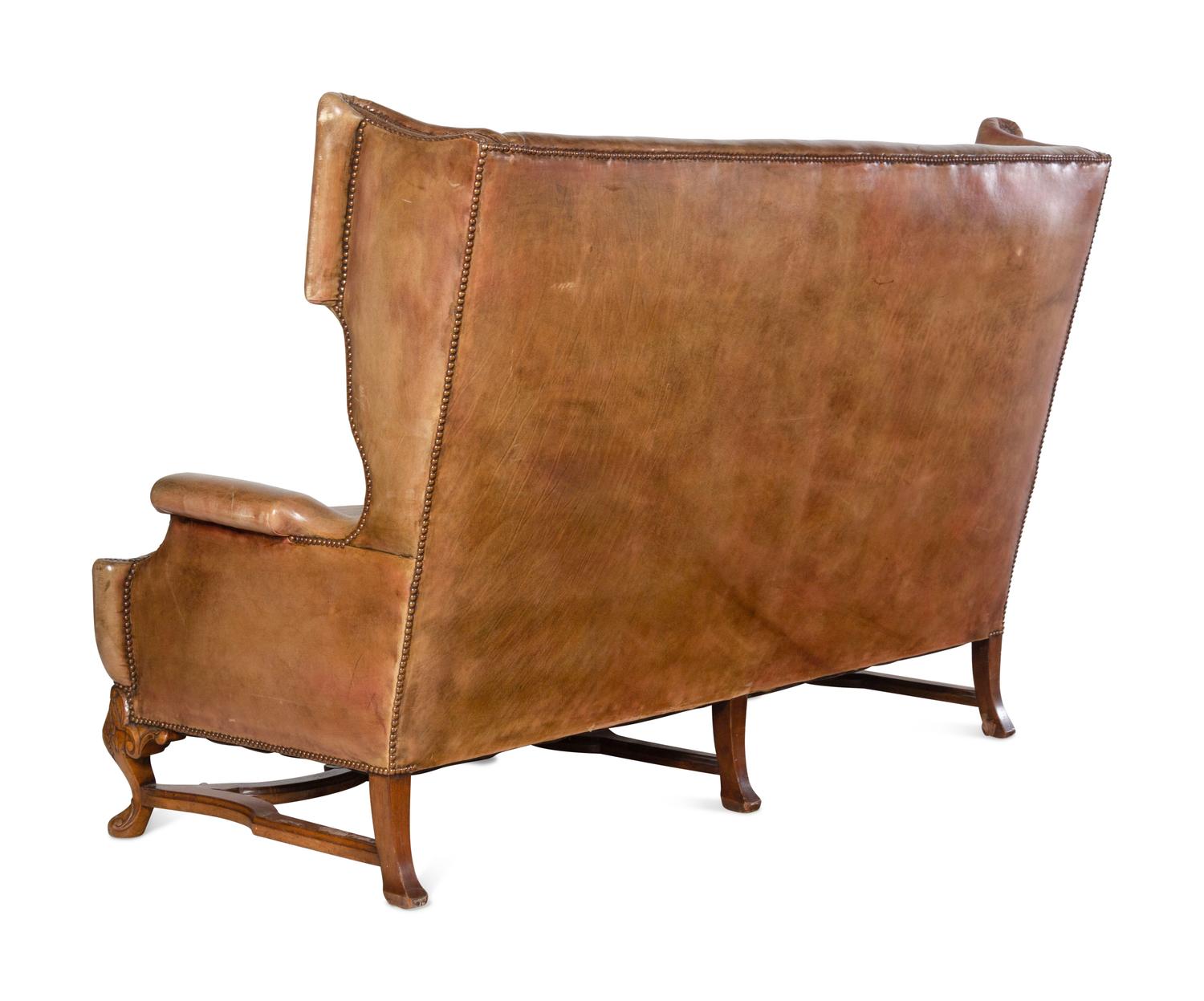 An English Leather-Upholstered Wingback Sofa