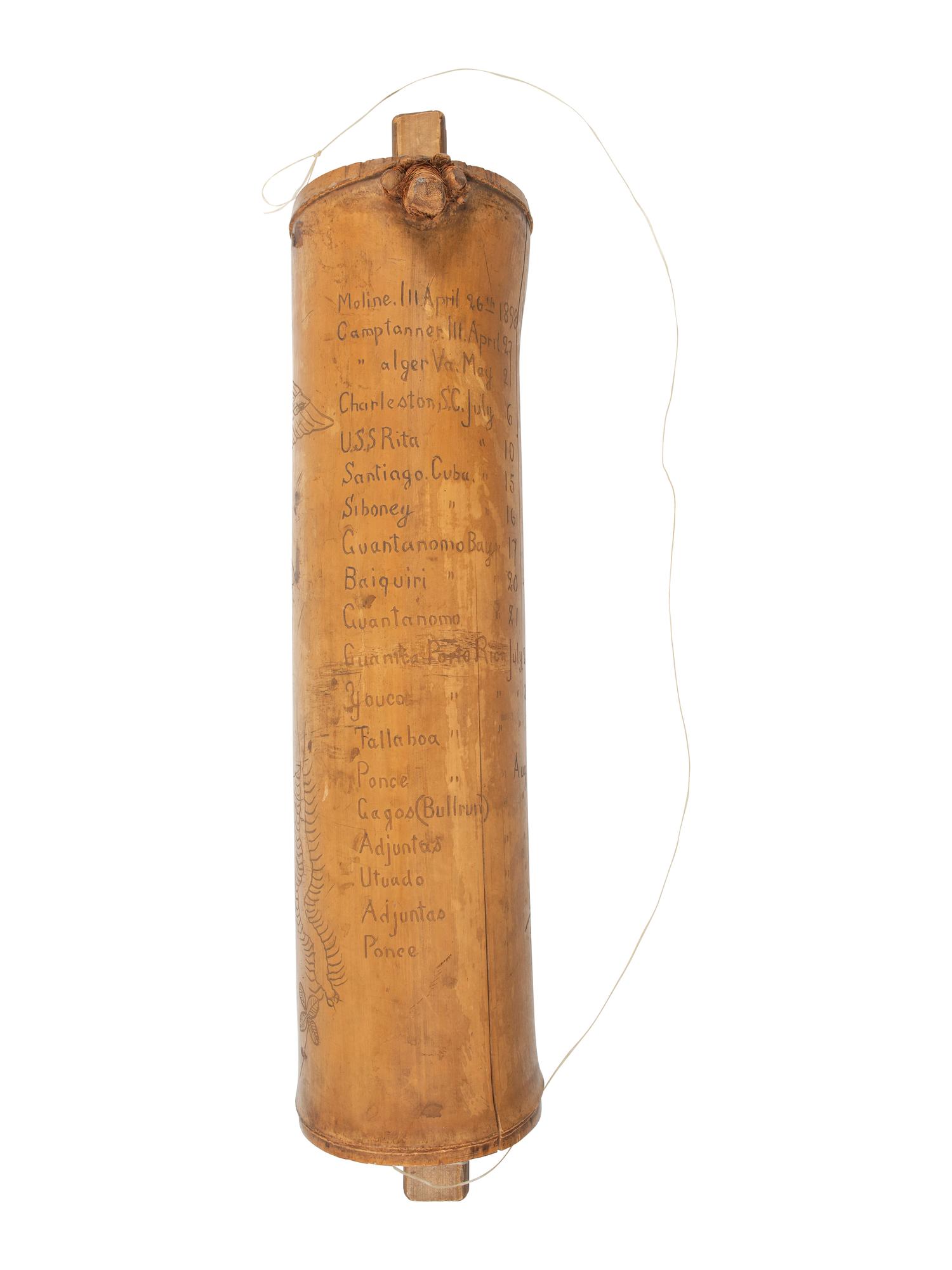 [SPANISH AMERICAN WAR]. Spanish American War-period bamboo canteen with folk art decoration. Ca late 19th century.