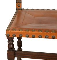 A Pair of Oak and Leather Side Chairs