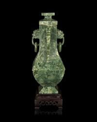 A Chinese Archaistic Green Hardstone Vase and Cover
