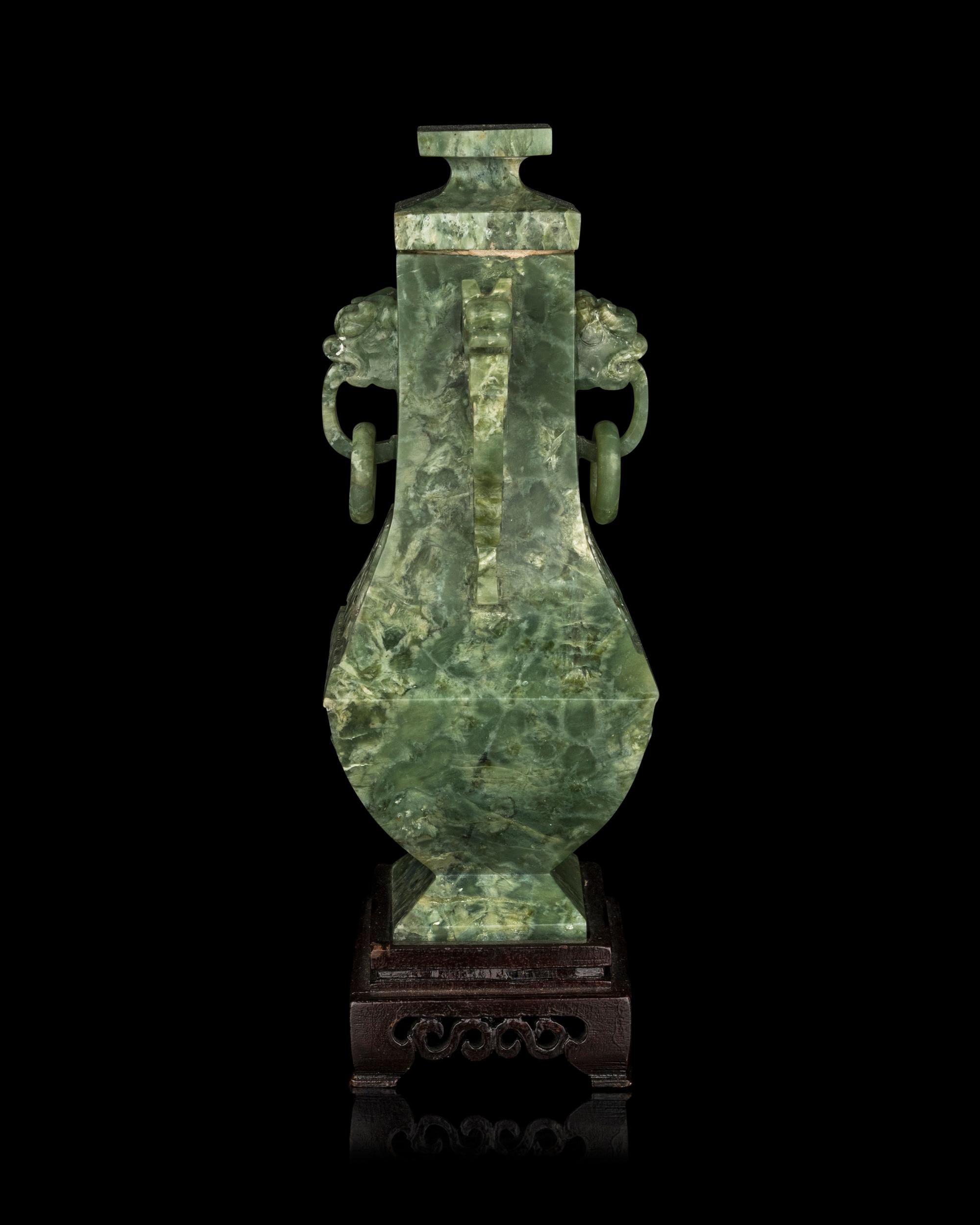 A Chinese Archaistic Green Hardstone Vase and Cover