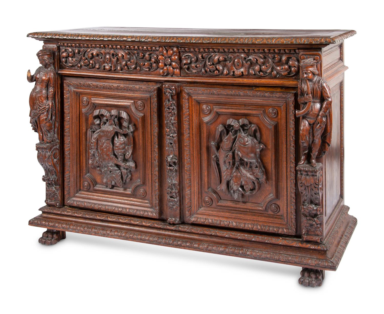 A Continental Carved Oak Cabinet