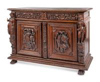 A Continental Carved Oak Cabinet