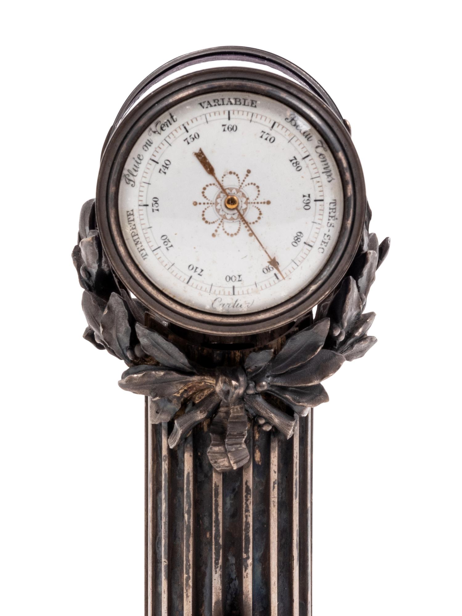 A Cartier Louis XVI Style Silver-Gilt and Guilloché Enamel Desk Clock and Barometer