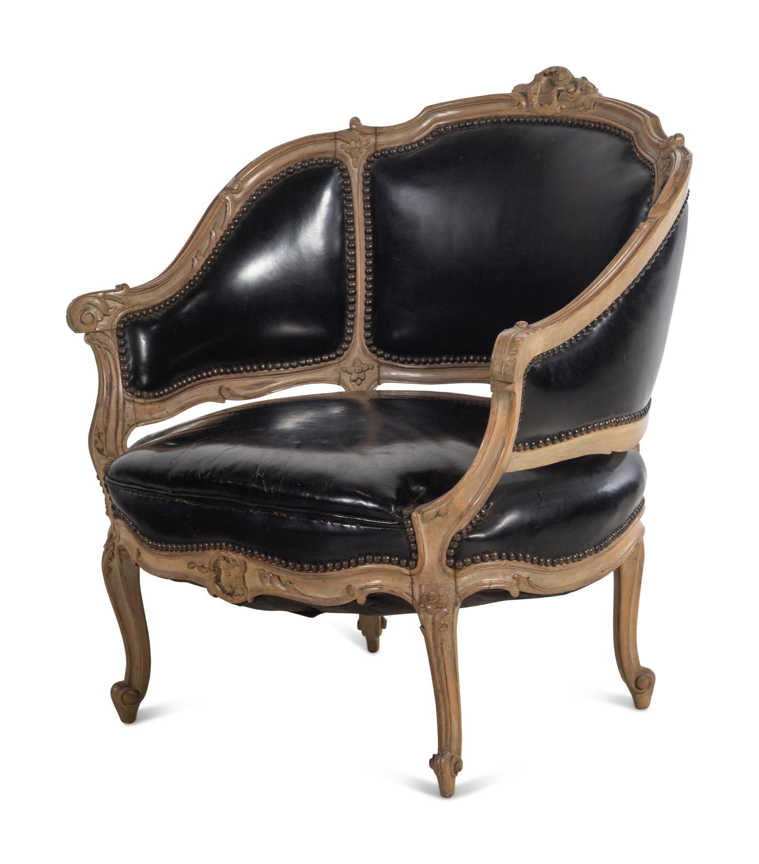 A Louis XV Style Painted and Black Leather Upholstered Bergère