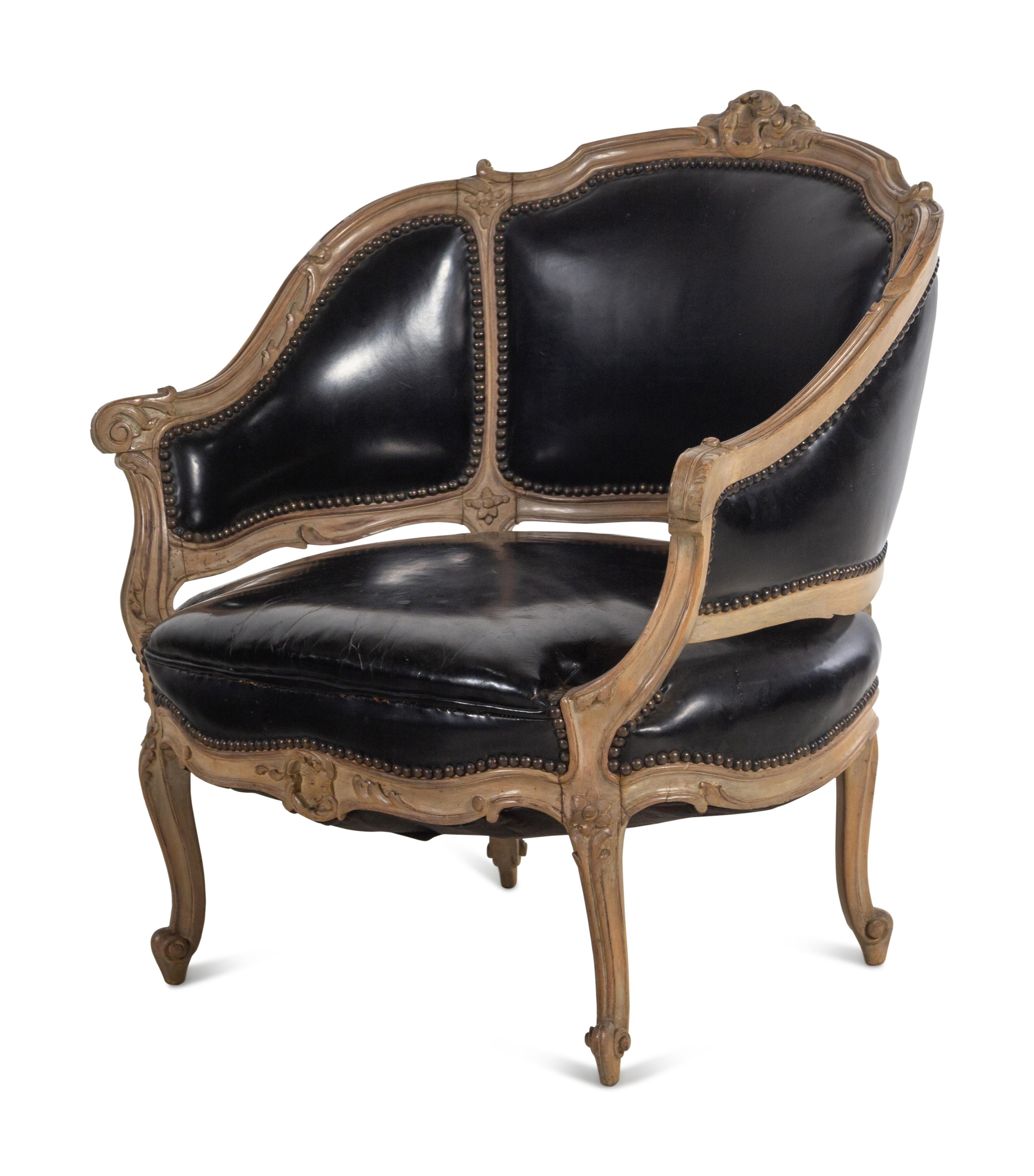 A Louis XV Style Painted and Black Leather Upholstered Bergère