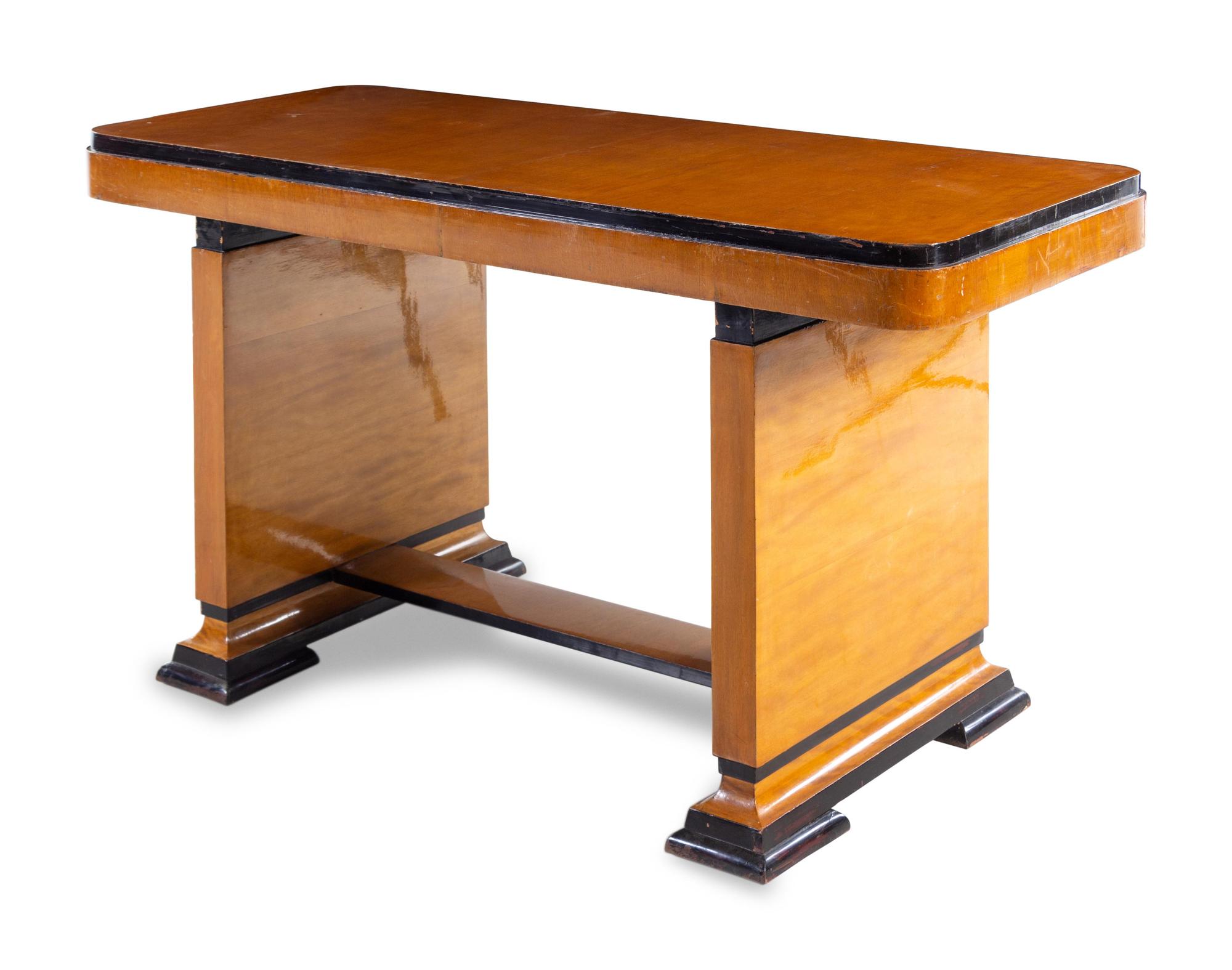 An Art Deco Parcel Ebonized Writing Table