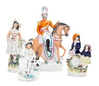 Four Staffordshire Figural Groups Height of tallest 11 3/8 inches.