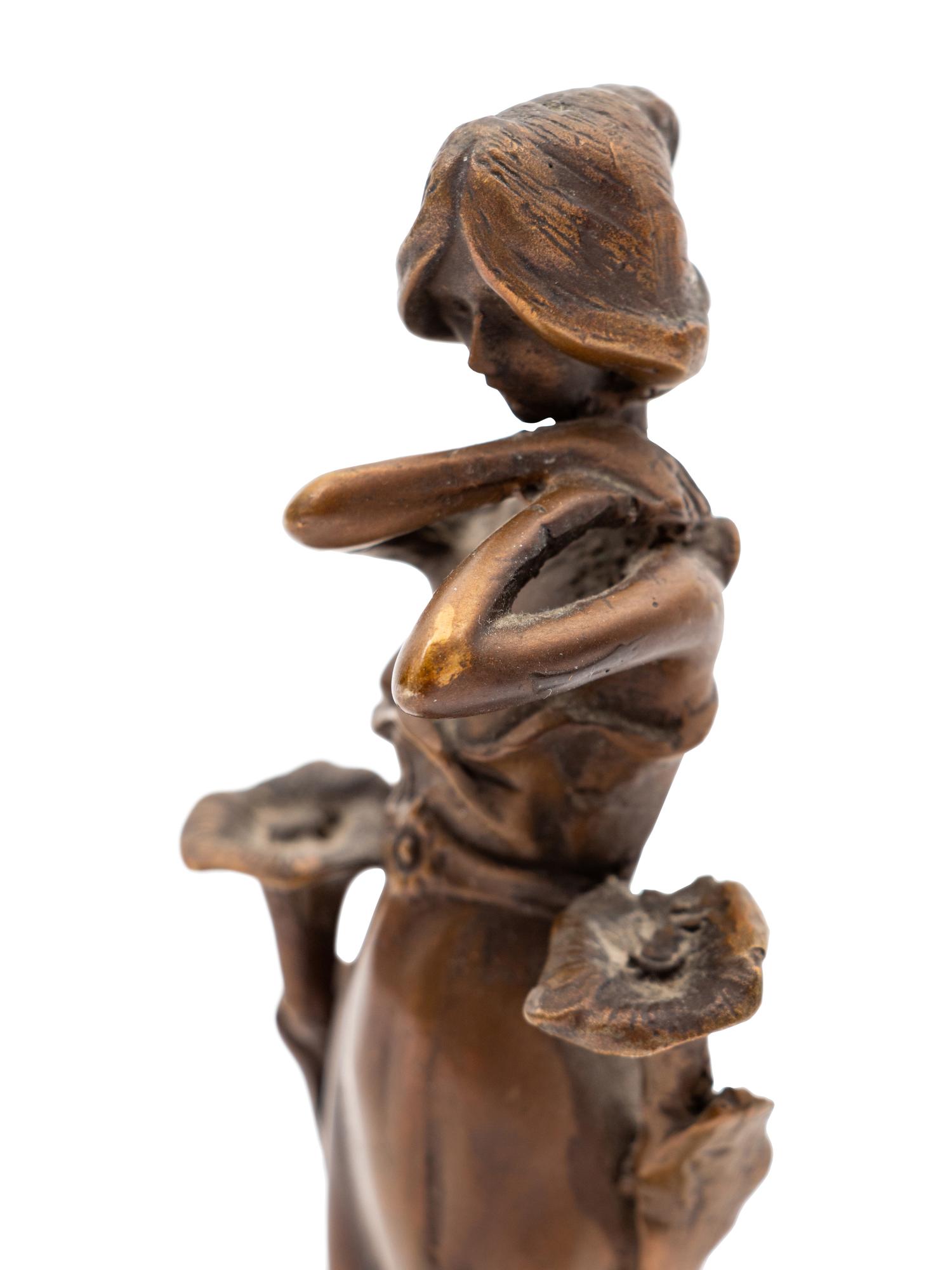 An Art Nouveau Bronze Statue
