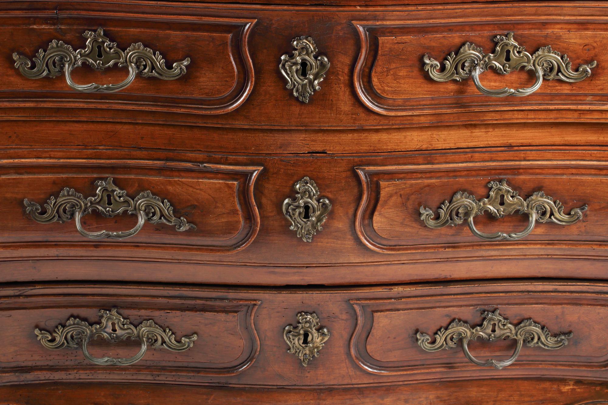 A French Provincial Walnut Chest of Drawers