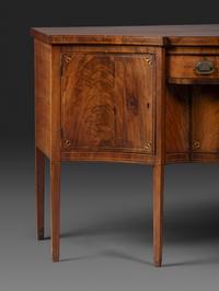 A Federal Fan-Inlaid and Figured Mahogany Serpentine Sideboard