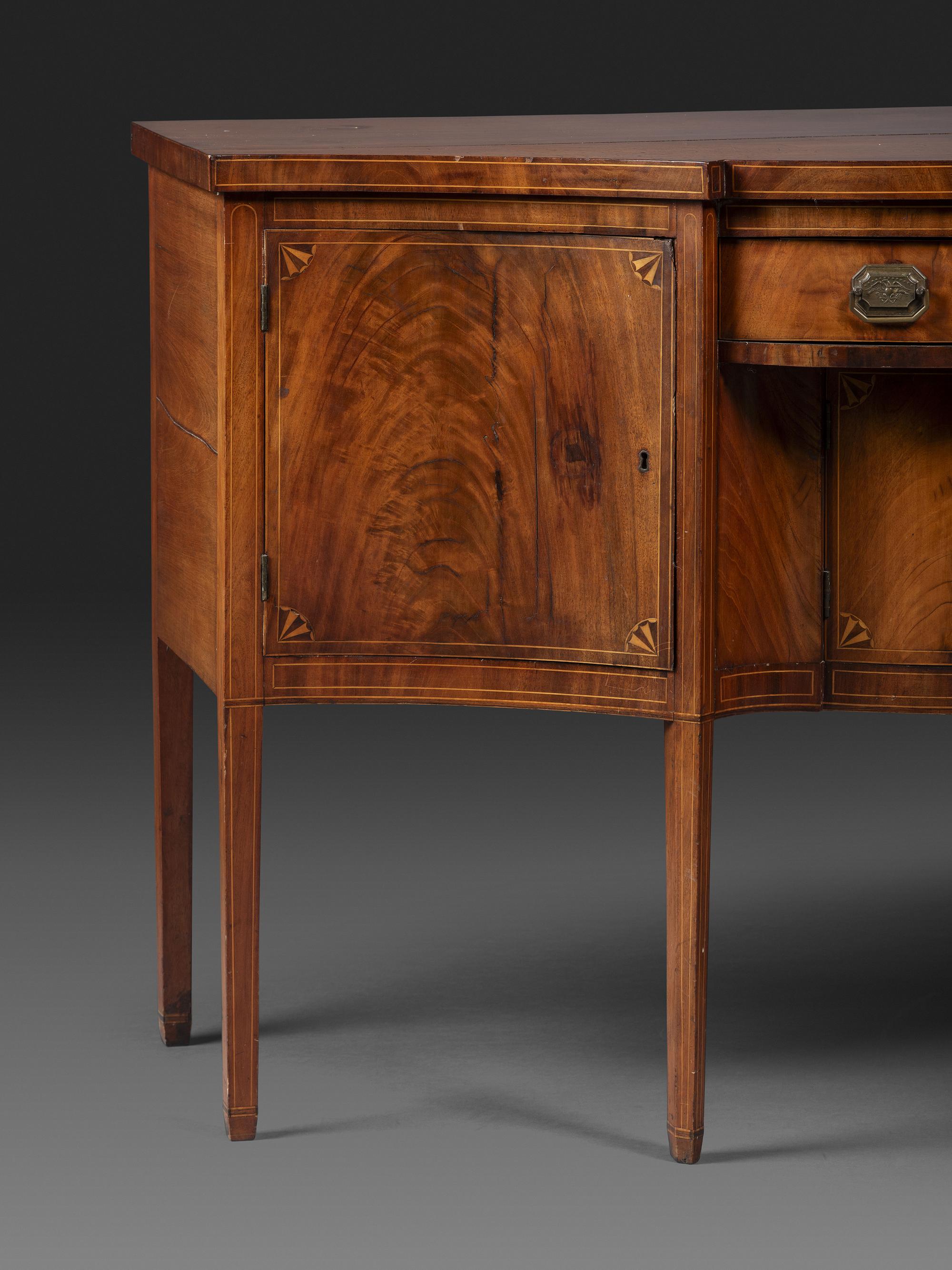 A Federal Fan-Inlaid and Figured Mahogany Serpentine Sideboard