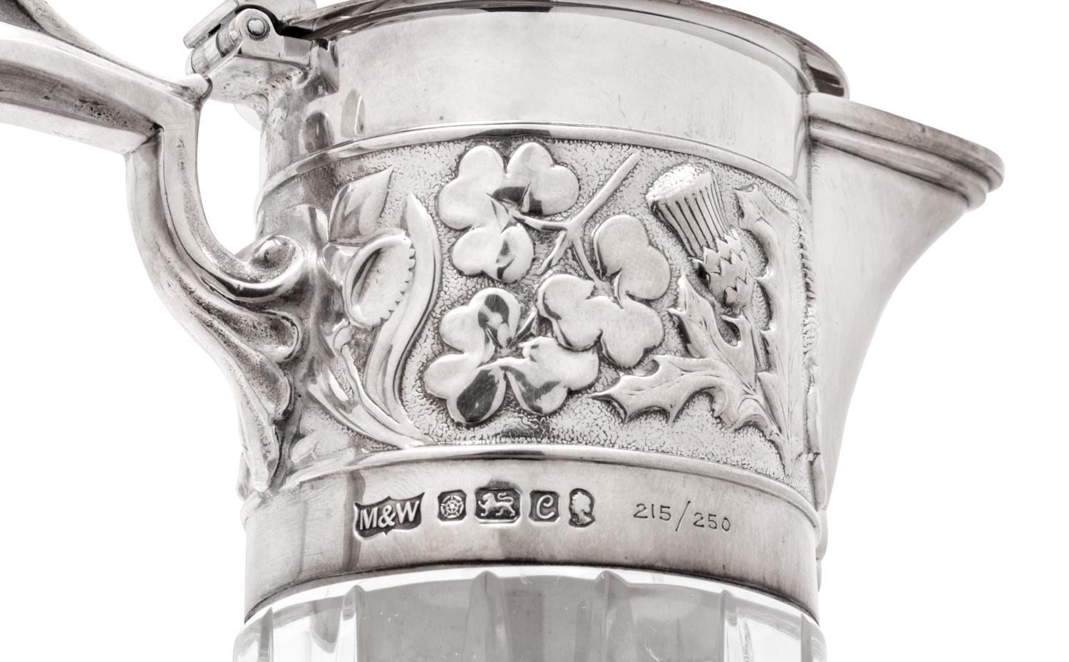 Two English Silver Mounted Cut Glass Claret Jugs