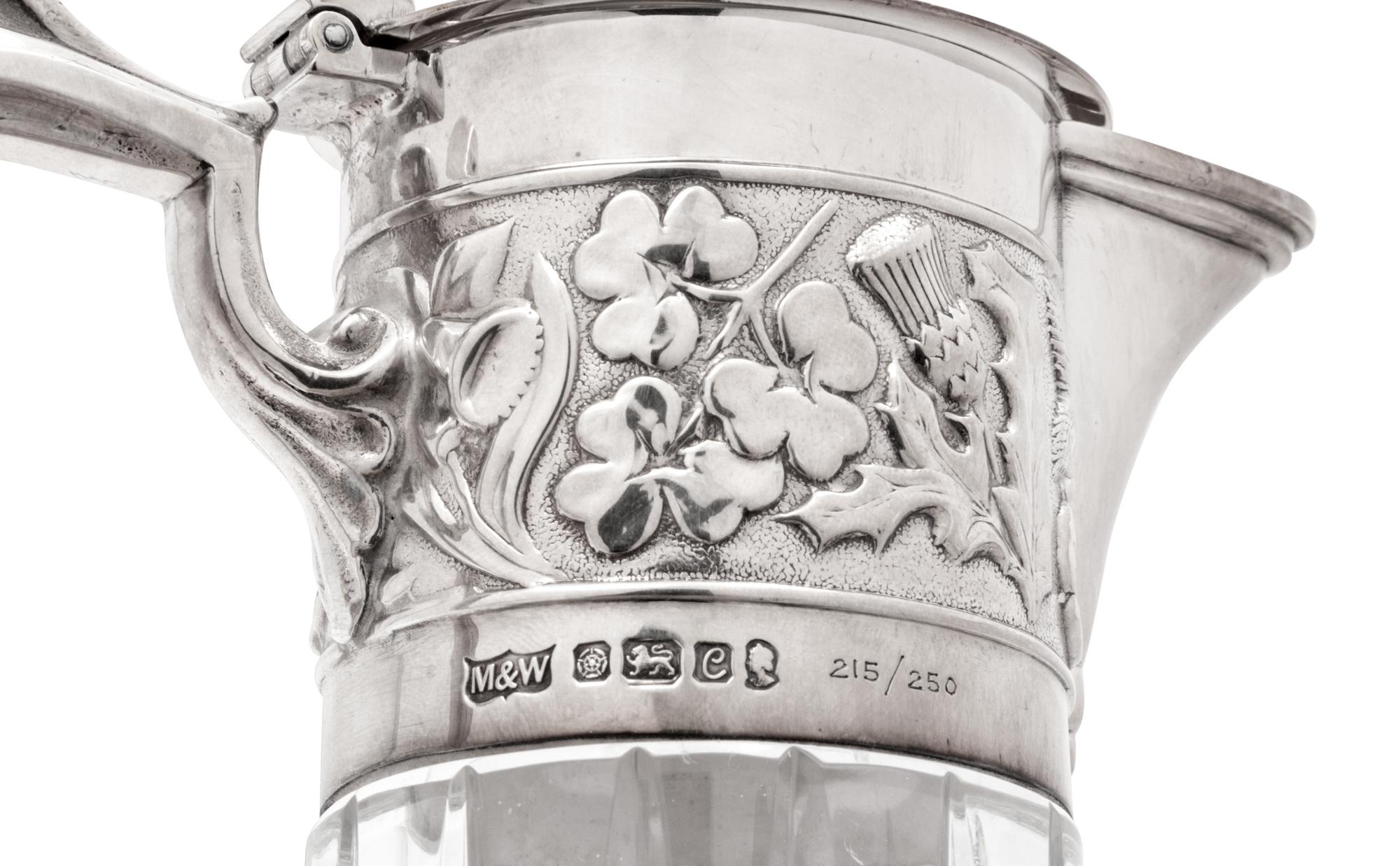 Two English Silver Mounted Cut Glass Claret Jugs