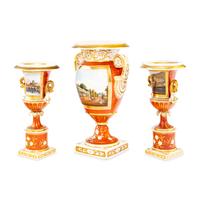 A Worcester Porcelain Hand Painted and Parcel Gilt Three-Piece Urn Garniture