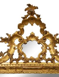 An Italian Rococo Carved Giltwood Mirror — 18TH CENTURY
