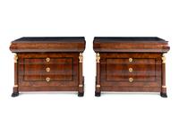 A Pair of German Neoclassical Mahogany and Parcel-Gilt Commodes