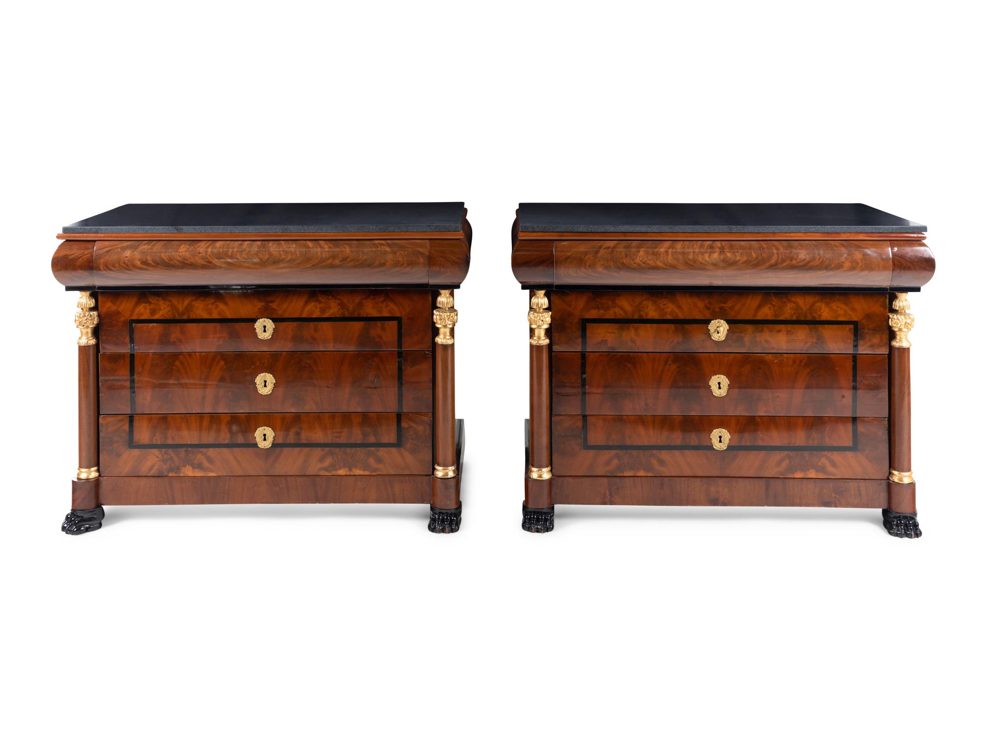A Pair of German Neoclassical Mahogany and Parcel-Gilt Commodes