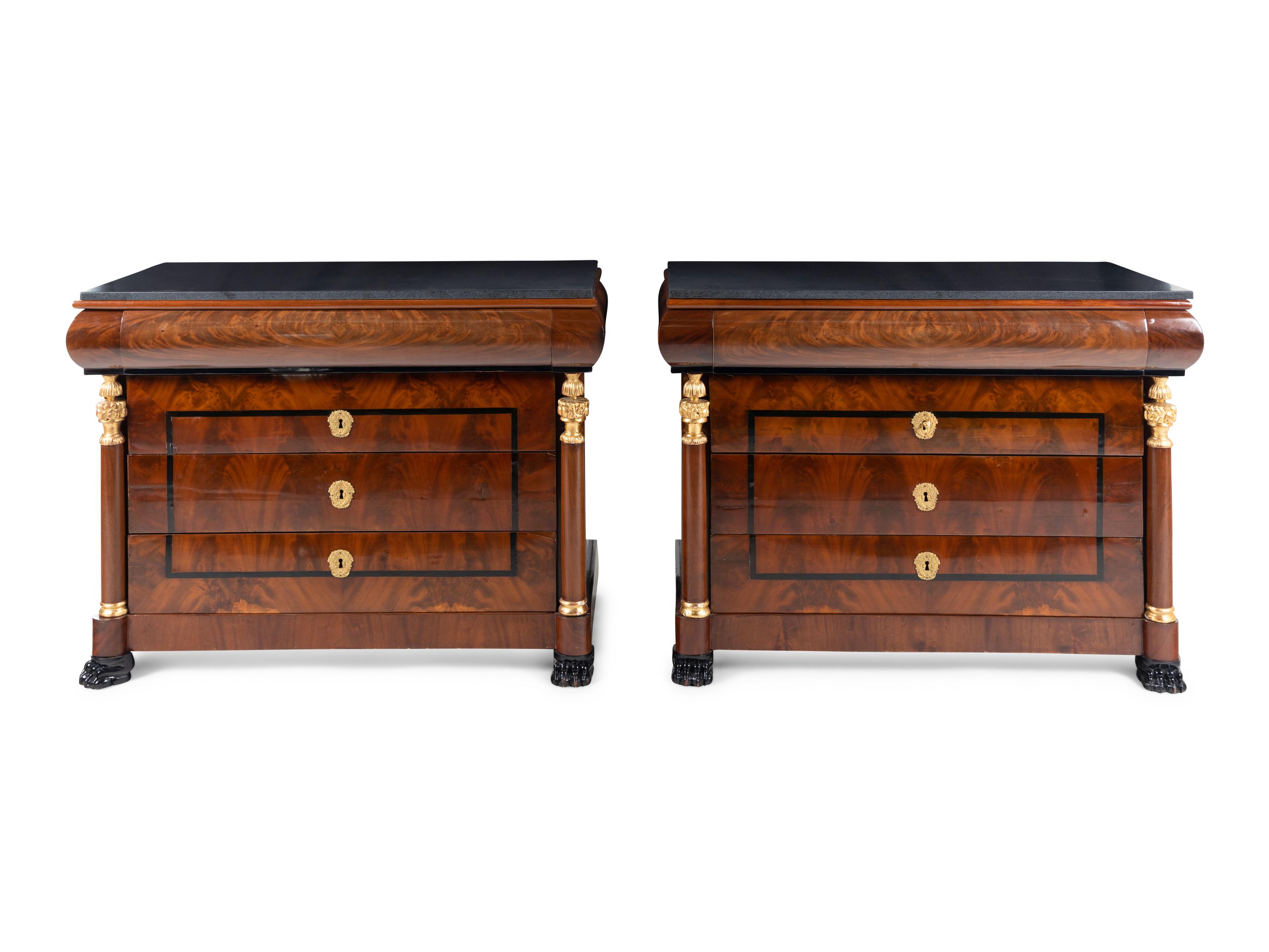 A Pair of German Neoclassical Mahogany and Parcel-Gilt Commodes