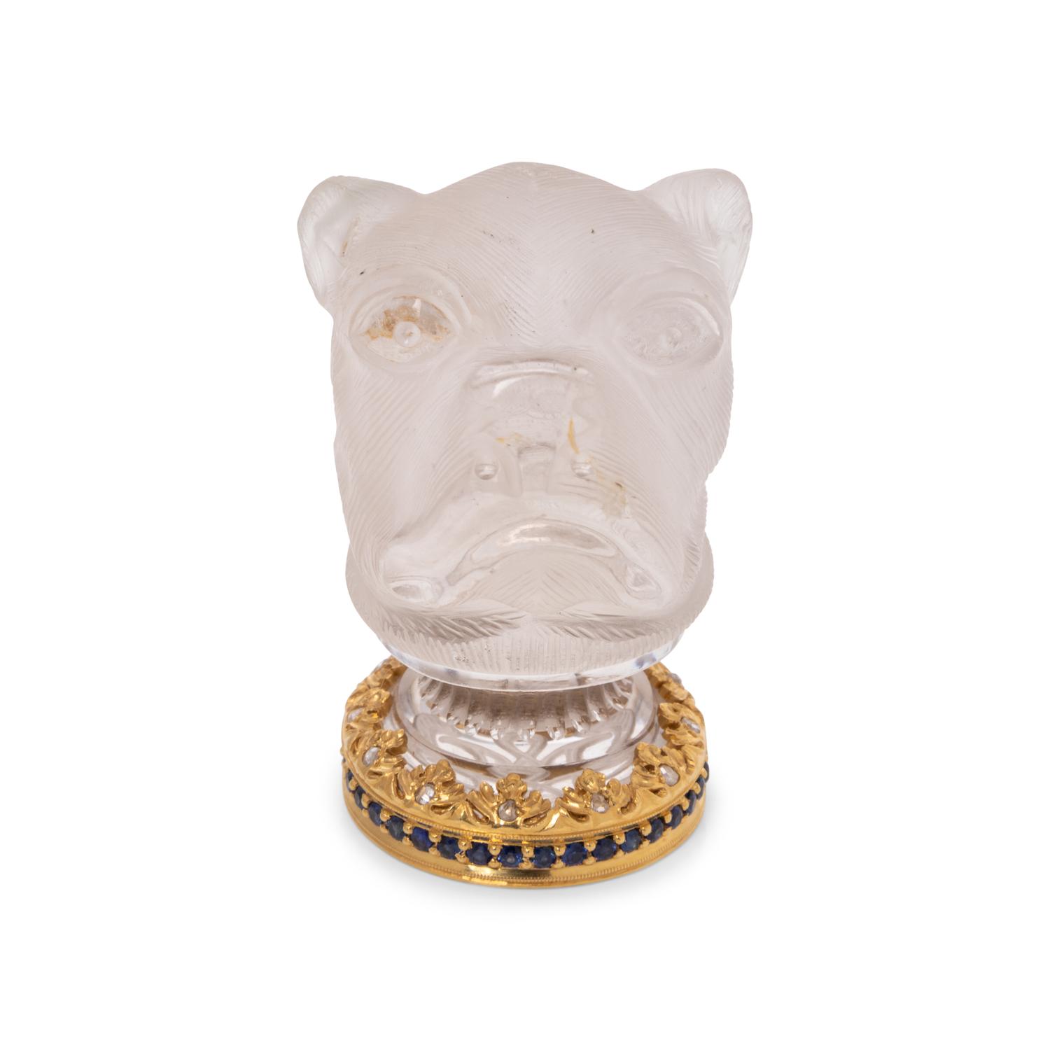 A Continental Gold, Diamond and Sapphire Mounted Carved Rock Crystal Hand-Seal