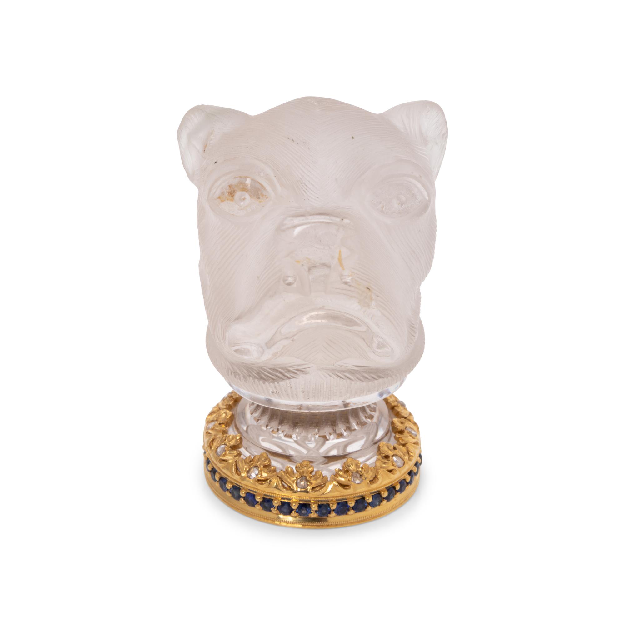 A Continental Gold, Diamond and Sapphire Mounted Carved Rock Crystal Hand-Seal